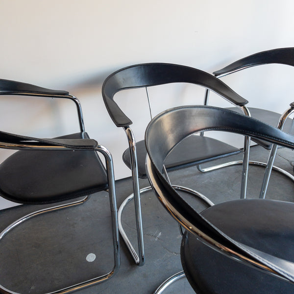 Black and Chrome Curved Leather Dining Chairs