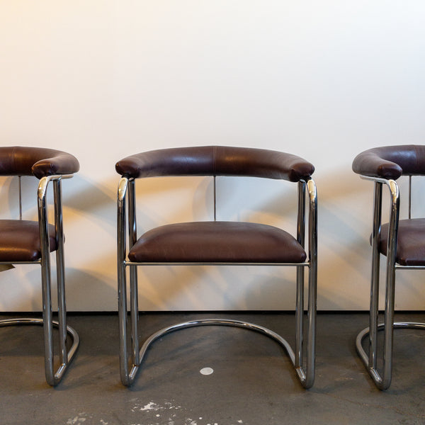 Bent Chrome and Maroon Vinyl Cantilever Chairs