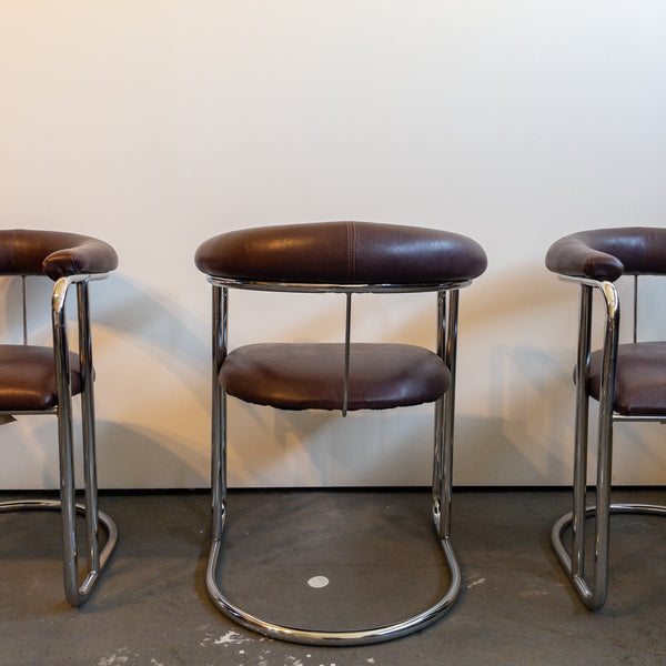 Bent Chrome and Maroon Vinyl Cantilever Chairs