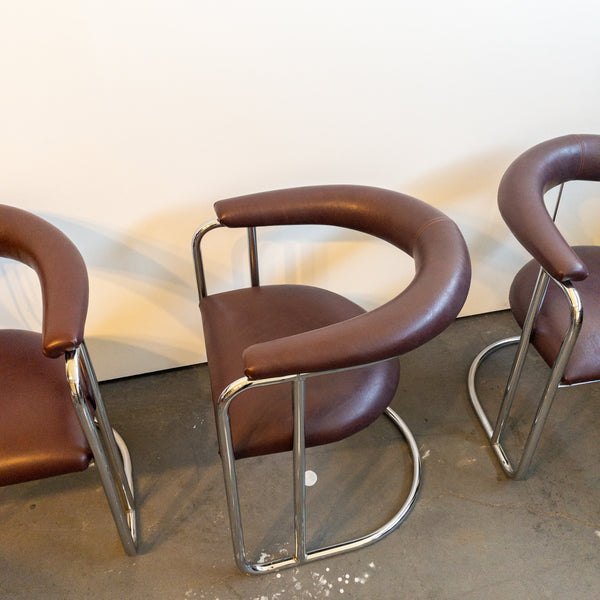 Bent Chrome and Maroon Vinyl Cantilever Chairs