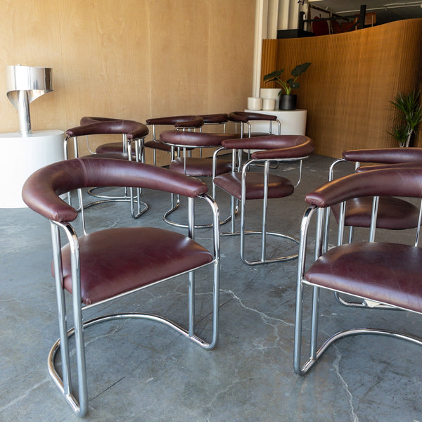 Bent Chrome and Maroon Vinyl Cantilever Chairs