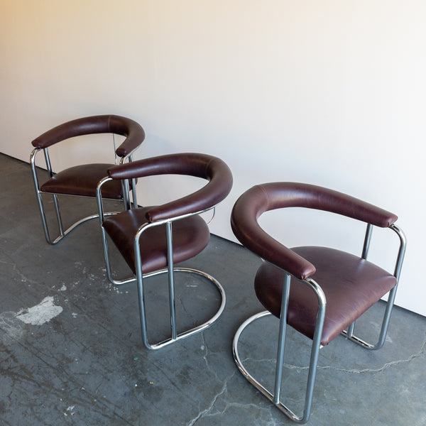 Bent Chrome and Maroon Vinyl Cantilever Chairs