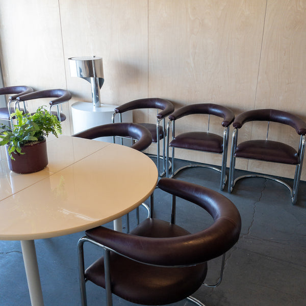 Bent Chrome and Maroon Vinyl Cantilever Chairs