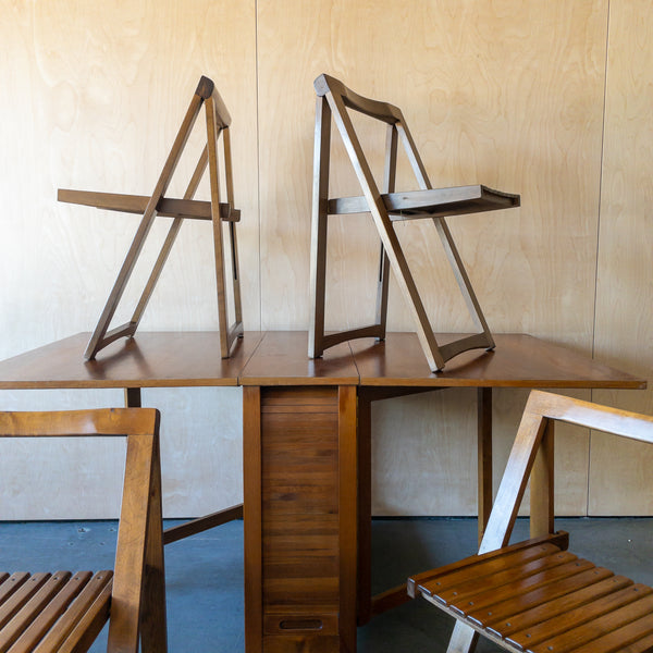 Romanian Drop Leaf Dining Table with Four Stow Away Chairs
