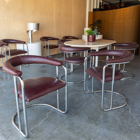 Bent Chrome and Maroon Vinyl Cantilever Chairs