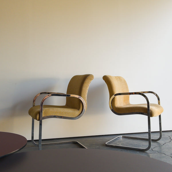 Chrome and Ribbed Textile Arm Chairs by John Saladino