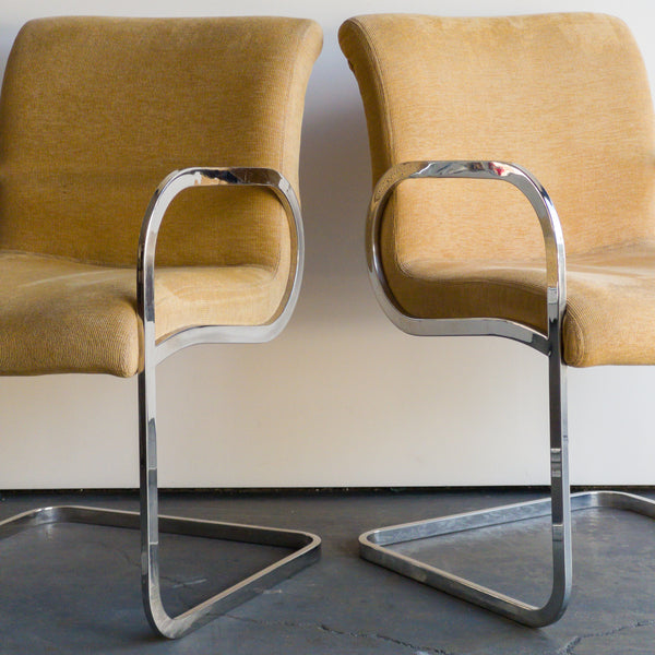Chrome and Ribbed Textile Arm Chairs by John Saladino